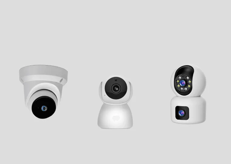 Three modern security cameras for surveillance and monitoring.