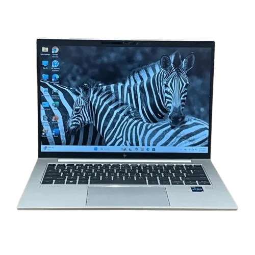 HP EliteBook 840 G9 laptop with zebra wallpaper on screen.