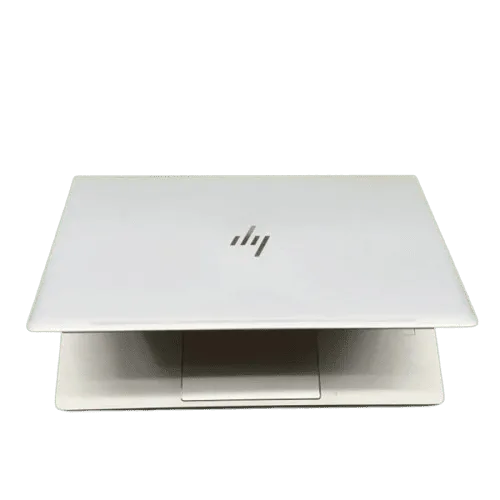 White HP Elitebook 640 G9 laptop with logo, closed, on a green background.