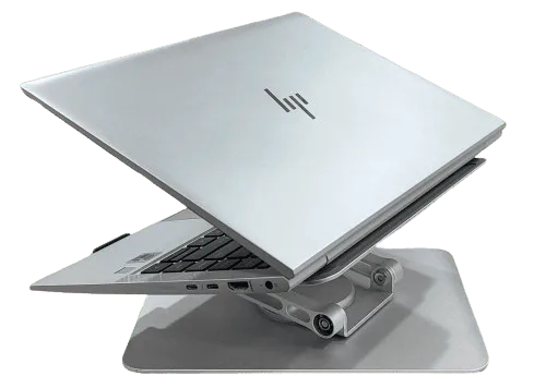 HP Elitebook 840 G7 laptop on adjustable stand for ergonomic use.