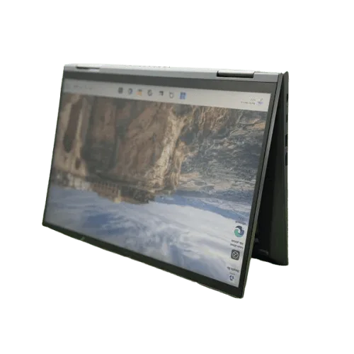 Lenovo X1 Yoga Gen 6 convertible laptop in tent mode on a green background.